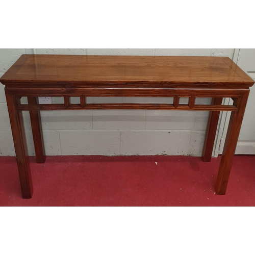 820 - Of really good quality. A Hardwood Fujian nanmu long side Table Side with pierced frieze outline on ... 