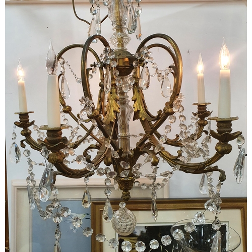 856 - A superb late 19th early 20th Century five branch Brass and Crystal Chandelier.  ( Bartra House).