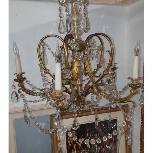 856 - A superb late 19th early 20th Century five branch Brass and Crystal Chandelier.  ( Bartra House).