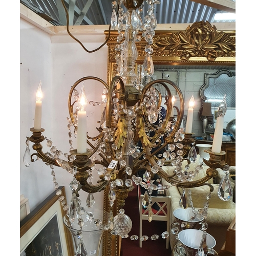 856 - A superb late 19th early 20th Century five branch Brass and Crystal Chandelier.  ( Bartra House).