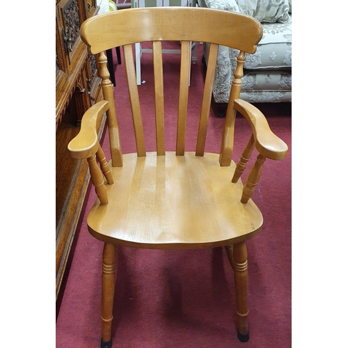 888 - A Windsor style Armchair. W 57 x SH 47 cm approx.