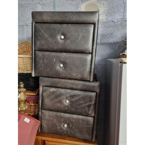 890a - A pair of leather lockers.