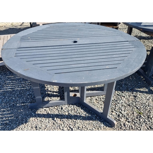 911 - A good hardwood fold up Table. ( Bartra House). H 74 Diameter 120 cm approx.