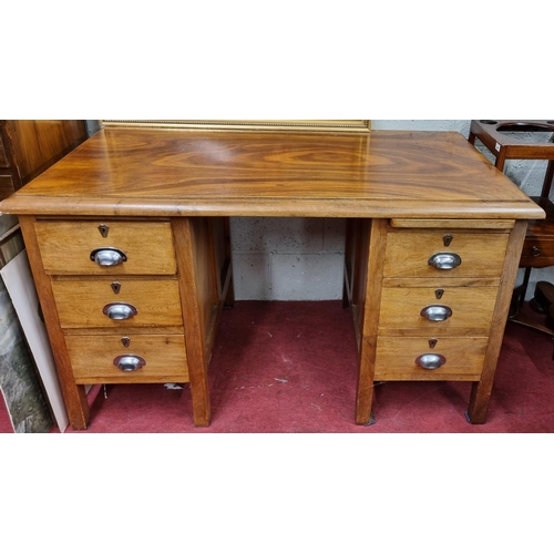 553 - A good Hardwood Desk with triple drawer sides and moulded top. W 132 x 68 x H 76 cm approx.