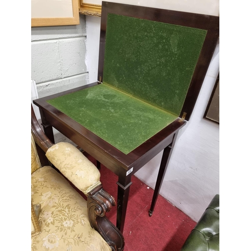 559 - An Edwardian Mahogany fold over Card Table on square tapered supports. 
H 72 x D 61 x W 80 cm approx... 