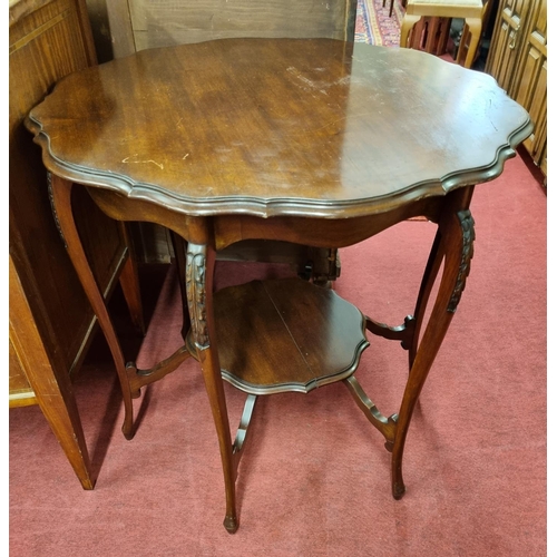 560 - An Edwardian Mahogany scalloped edge Table. D 75 x H 70 cm approx.