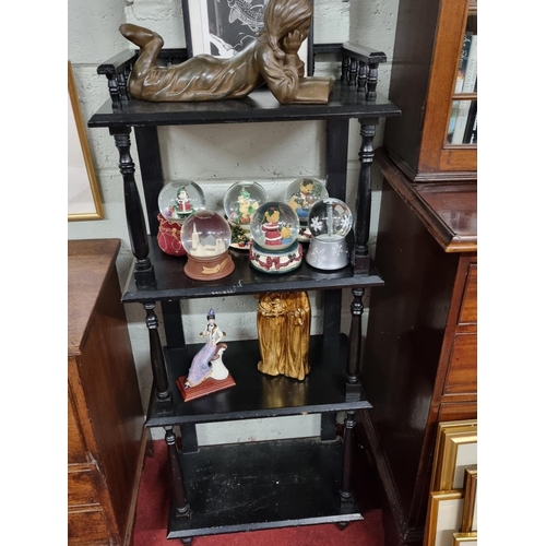 561 - An early 20th Century ebonised four tier whatnot. w 51 x D 27 x H 121 cm approx.