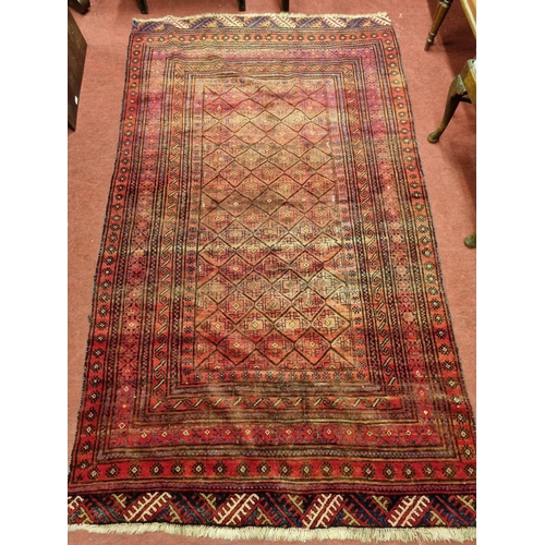 844 - An Afghan Baluchi nomadic Rug with an all over decoration. 250 x 146 cm approx.