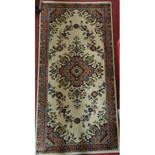 849 - A good Woodward Grosvenor Rug with cream ground multi borders and allover decoration. 181 x 90 cm ap... 