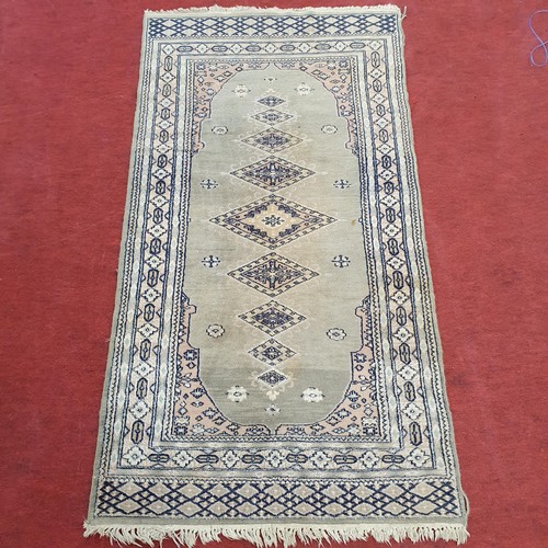 863 - Grey Blue Ground Rug .
L 170 x W 89 cm approx.