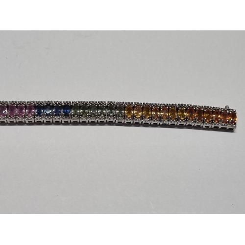 332 - A Gem set Bracelet set in Silver. 18cms approx long.