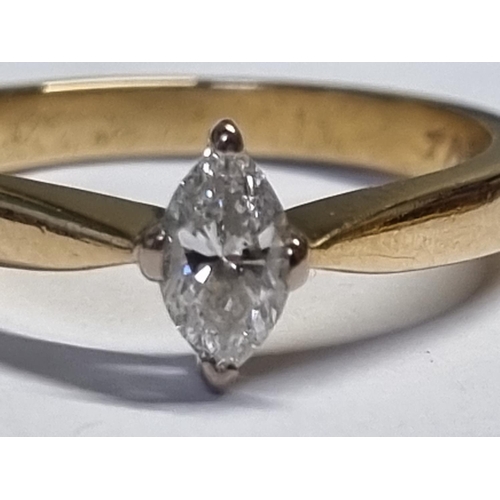 398 - An 18ct Gold Marquises cut Solitaire Ring. Size N.