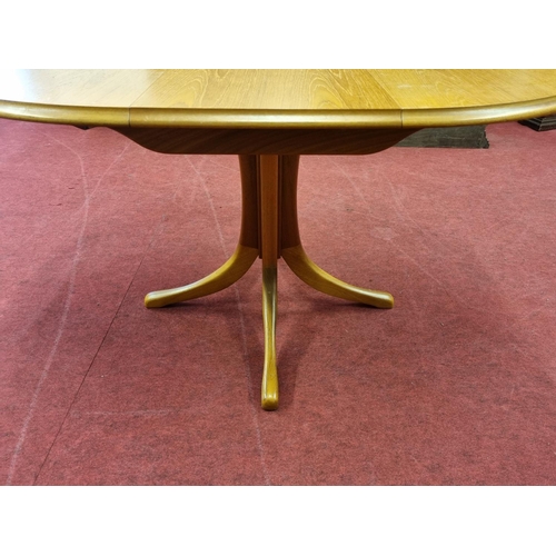 430 - A mid Century style single leaf Dining Table with pull out leaf along with a set of four well uphols... 