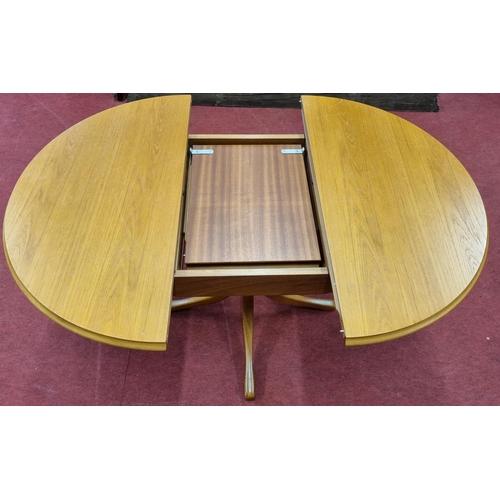 430 - A mid Century style single leaf Dining Table with pull out leaf along with a set of four well uphols... 