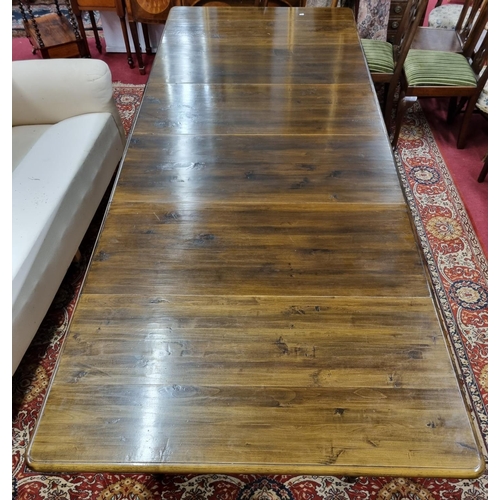 419 - A very large three leaf Dining Table with pull out centre on turned supports. 109 x 290 x H 77 cm ap... 