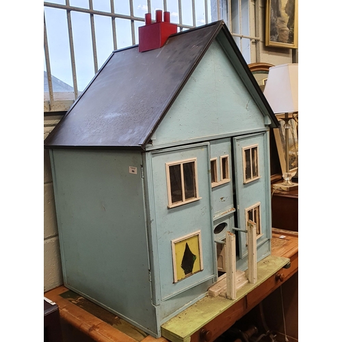 86 - A very large early 20th Century Dolls House. H 105  X W 83 cm approx.