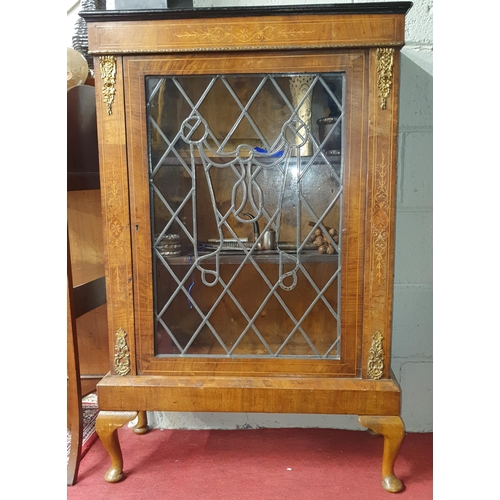 198 - A 19th Century Walnut and Inlaid single door Side Cabinet with leaded panel glass front and ormolu m... 