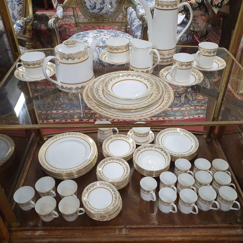 504 - An extremely good quantity of Elizabethan Porcelain Dinnerwares 'Swiss Cottage' pattern.