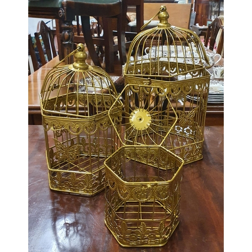 518 - A set of Three Birdcages in Gold. Large cage dimensions ( H x W x D). 43 x 23 x 23 cm approx.
Medium... 