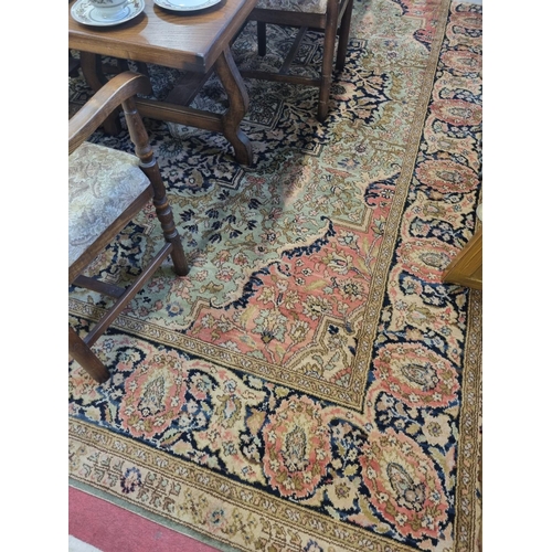 297 - A very large Vintage Iranian design Carpet with unique colours of cream and pink ground and a large ... 