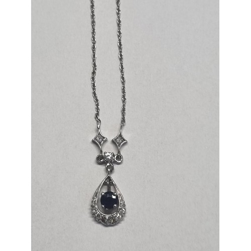 399 - A sapphire and single-cut diamond necklace. Stamped 14K.Length 38.5cms. 3.1gms.