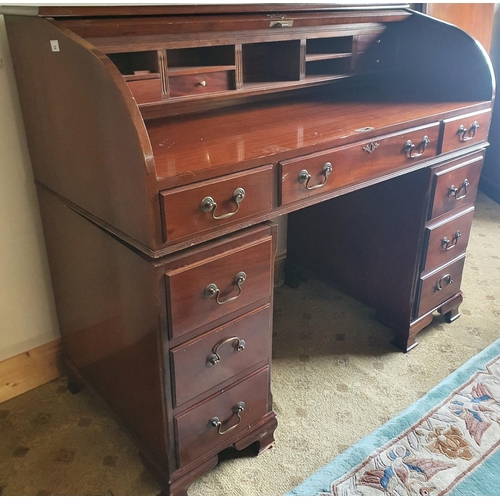 571 - A modern Mahogany Bureau with tambour door front. W 122 x D 58 x H 105 cms approx.