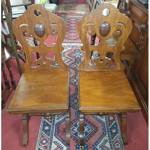 1042 - A really good pair of 19th Century Mahogany Hall Chairs with a highly carved stretcher base and pier... 