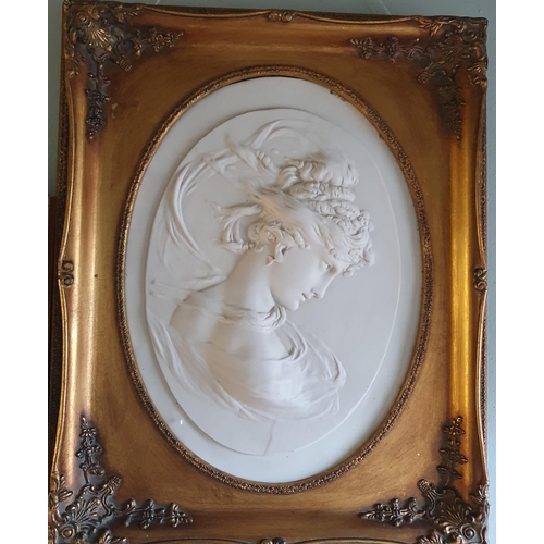 521 - A good pair of framed Parian Ware Plaques with a Medallion imbedded verso. 52 x 42 cm approx.