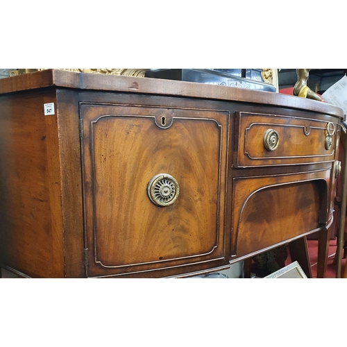 547 - A good late 19th Century bow fronted Sideboard with twin doors flanking central drawers on square ta... 