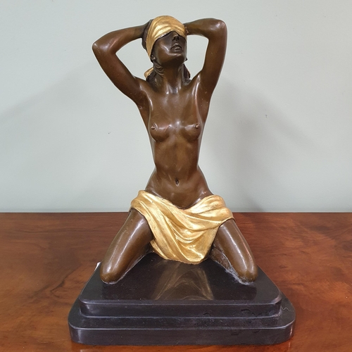 554 - An Erotic bronze figure of a female nude with a blindfold and cloth painted in gold. Dimensions (H x... 