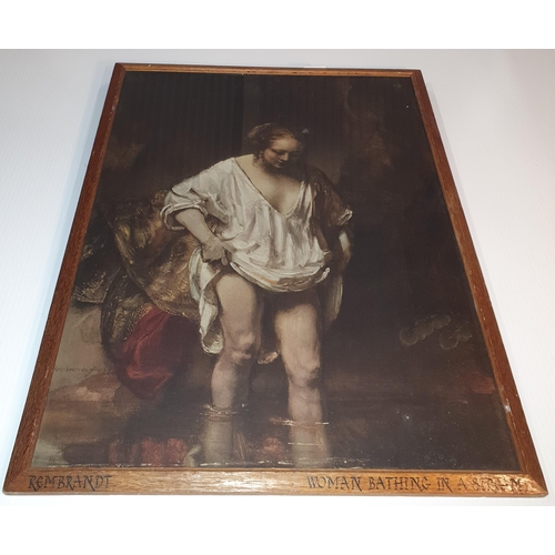 556 - After Rembrandt;  A colour Print of a woman bathing in a stream. 63 x 48 cm approx.