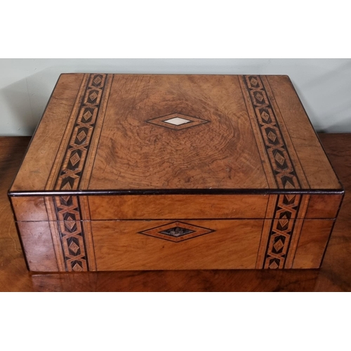 1026 - A 19th Century Walnut and Parquetry inlaid Writing Slope.