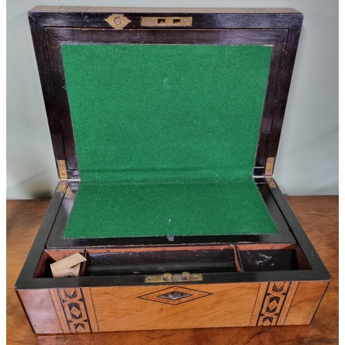 1026 - A 19th Century Walnut and Parquetry inlaid Writing Slope.