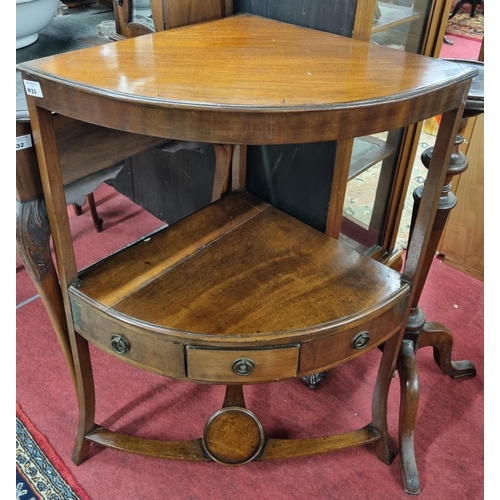 1033 - A good Georgian Mahogany three tier corner Table with single freeze drawer and gallery base. 43.3 x ... 