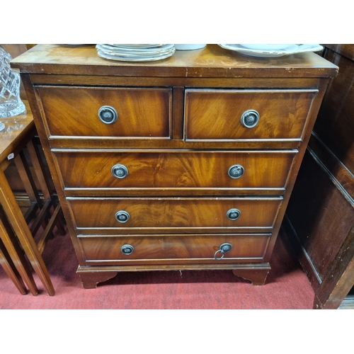 1050 - A early 20 Century Mahogany nest of three Tables, a modern Chest and a small Mahogany drop leaf Tabl... 