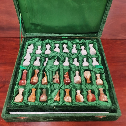 1197 - A Fine Quality '' Onyx'' Marble Chess set Enclosed in a Green Velvet Box .