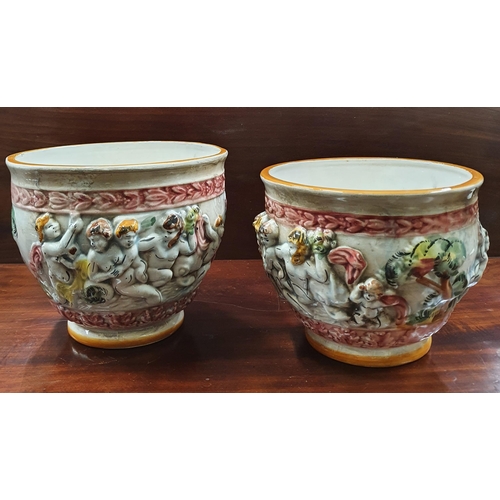 157 - A pair of early Capodimonte Jardinieres with highly painted exteriors along with other vases and jug... 