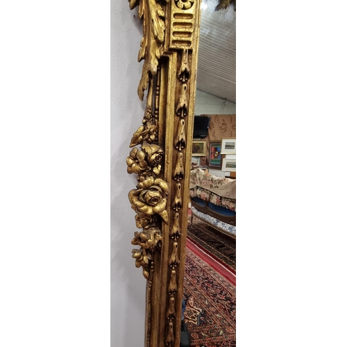 257 - A fabulous Timber and plaster Gilt overmantel Mirror with a highly molded outline, highly molded ped... 