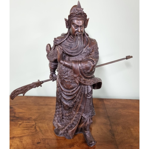 475 - A Bronze Figure Legendary Chinese General Guan Yu.

Dimensions (H x W x D) approx. 40 x 40 x 15 cm