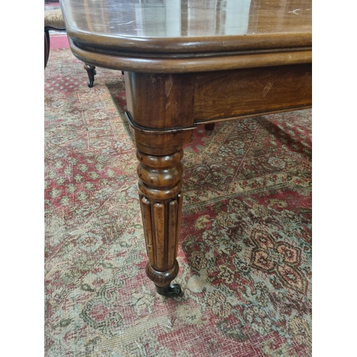 466 - A good early to mid 19th Century single leaf Dining Table with good reeded supports and reeded mould... 