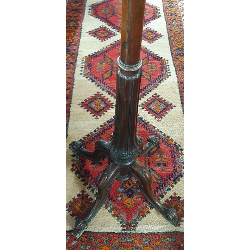 44 - A 19th Century Stand with quatrefoil base. H 137 cm approx.