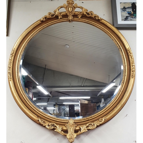 43A - A Fantastic large circular Wall Mirror with highly moulded outline, bevelled glass and cartouche mou... 