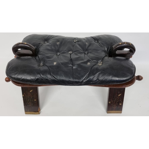 768 - A good Hardwood camel Stool with black Leather deep buttoned top. 74 x 39 x H 40 cm approx.