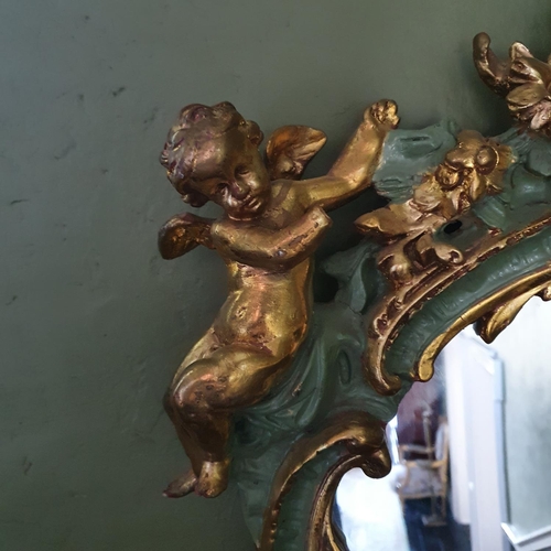 771 - A Spectacular pair of Gilt and hand painted Mirrors with cherub outline profusely moulded mirror gla... 