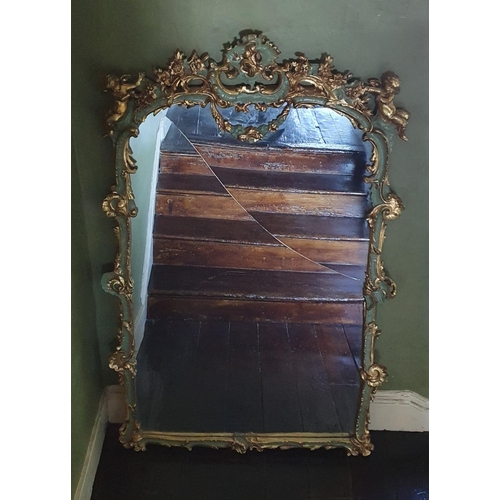 771 - A Spectacular pair of Gilt and hand painted Mirrors with cherub outline profusely moulded mirror gla... 