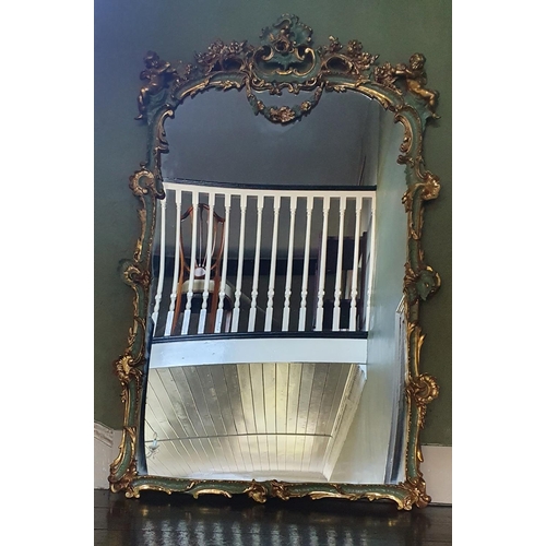 771 - A Spectacular pair of Gilt and hand painted Mirrors with cherub outline profusely moulded mirror gla... 