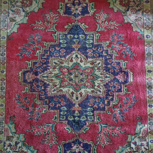 772 - A washed Red and Blue ground Persian Tabriz Carpet with bespoke central medallion design. 187 x 252 ... 