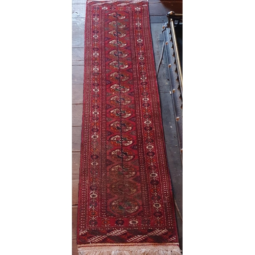 853 - A small Persian Rug. 200 x 53 cm approx.