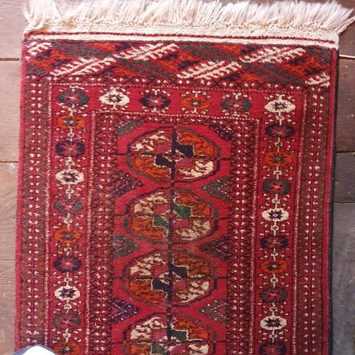 853 - A small Persian Rug. 200 x 53 cm approx.