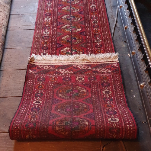 853 - A small Persian Rug. 200 x 53 cm approx.